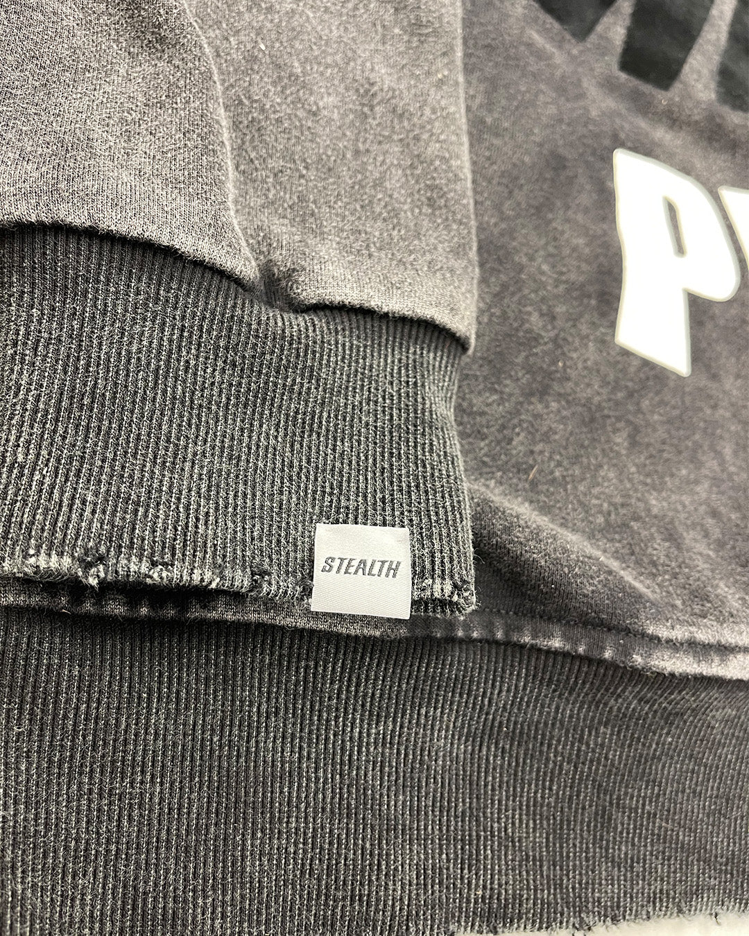 SIGNATURE STEALTH HEM TAG